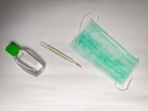 PPE items like hand gloves, face mask, and Sanitizer Stock Photos