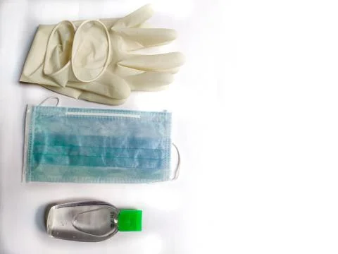 PPE items like hand gloves, face mask, and Sanitizer Stock Photos