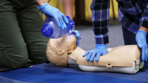 Practical advices for first aid on a mannequin.  Stock Footage 146747106