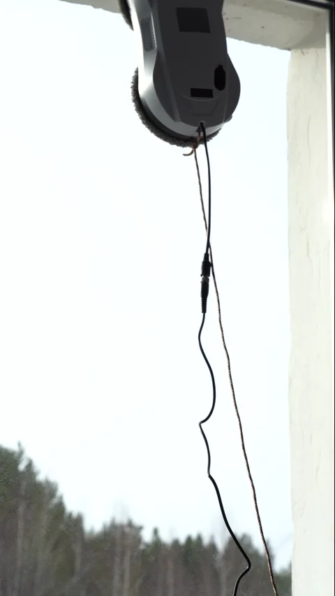 A Practical Window Cleaning Device Demonstrating Effective Usage with Remote Stock Footage 333514368