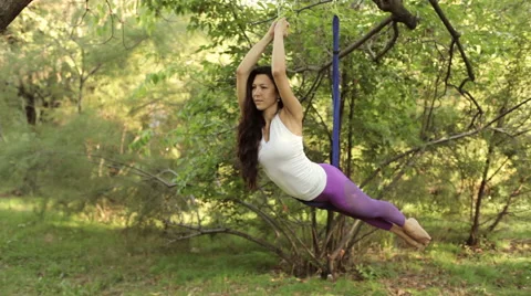 Practice of anti gravity fly yoga with hammock Stock Footage 68500130