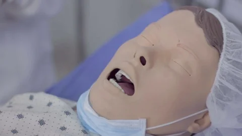 Practice Doll with Oxygen Mask Vídeos de archivo 75165167