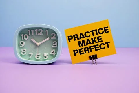 Practice Make Perfect text and alarm clock on blue and purple background Stock Photos