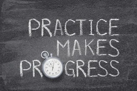 Practice makes progress watch Stock Photos