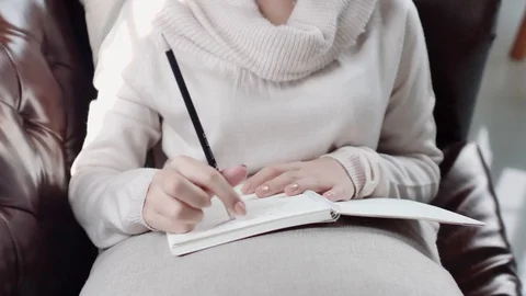 Practice writing skills and write notes. Create new ideas The story in the book Stock Footage 108647553