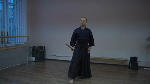 Practicing Fencing Kendo Man Spends Morning Training Before the Tournament Stock Footage 85582222