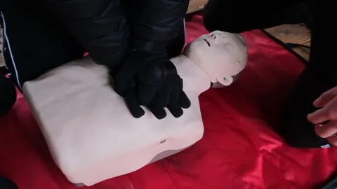 Practicing first aid on mannequin Stock Footage 144607208