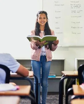 Practicing her presentation skills. a young schoolgirl giving a presentation in Foto stock