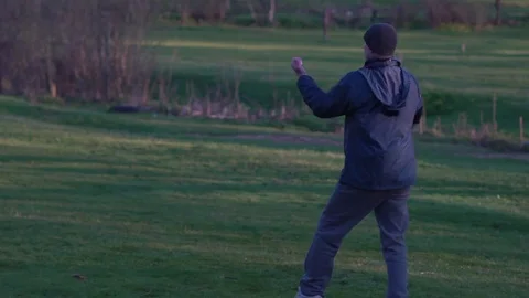 Practicing Kata Karate Guy Trains in the Morning in the Woods in Early Spring Stock Footage 74692527