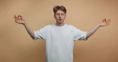 Practicing mindfulness through hand gestures in a simple studio setting wit.. 스톡 동영상 328247170