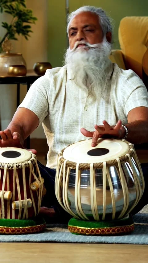 Practicing tabla rhythms at home, Indian mid age man doing riyaz Video stock 342757221