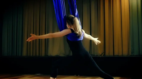 Practicing yoga in the air Stock Footage 38478204