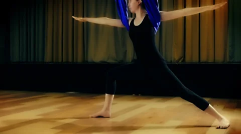 Practicing yoga in the air Stock Footage 38489306