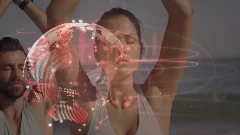 Practicing yoga, people with digital world map animation overlay in background Stock Footage 329418338