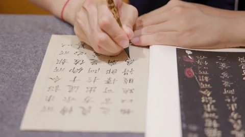 Practise Chinese calligraphy in the evening Stock Footage 152932891