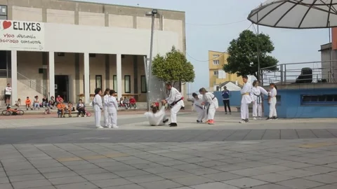 Practising taijitsu in a square Video stock 219237941