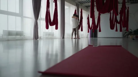 Practitioner Embraces Partner On Nail Board In Serene Studio Stock Footage 310519839