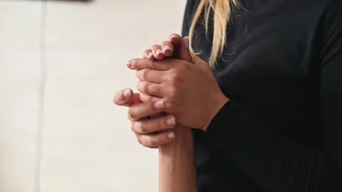 A practitioner performs manual therapy on a client, focusing on muscle Видео 344380158