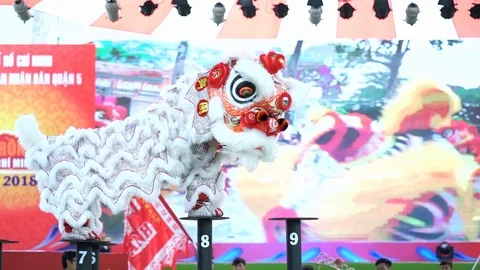 Practitioners in costume lion dance Stock Footage 117400640