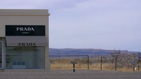 Prada Marfa Store sculptural art installation by artists Elmgreen &amp; Dragset Stock Footage 229821474