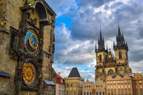 The Prague Astronomical Clock located at the Old Town Hall and the Church of  Stockfoto's