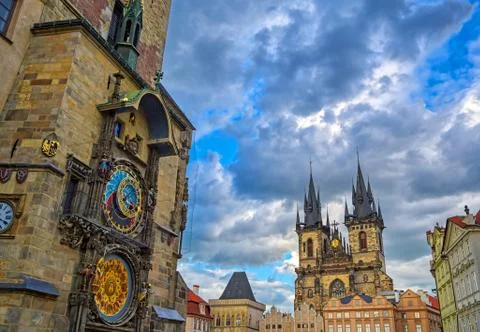 The Prague Astronomical Clock located at the Old Town Hall and the Church of  Stockfoto's