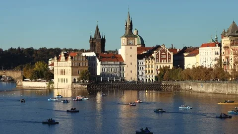 Prague - August 2018: Old Town view with river and people on paddle boats. 4K Stock Footage 95925155