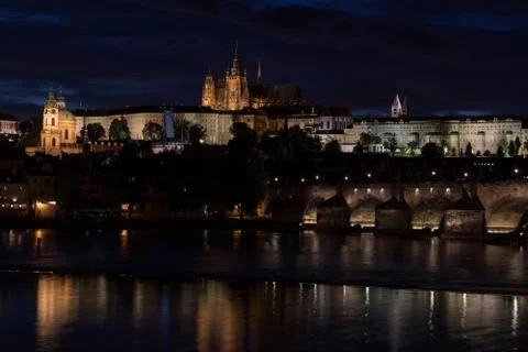 Prague Castle and Charles bridge after sunset Stock Photos