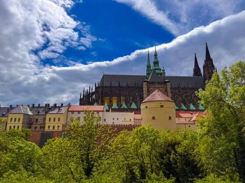 Prague Castle and the Gothic St Vitus Cathedral towering above it in the Cz.. Photos
