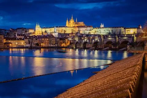 Prague Castle in the early evening, view from the Old Town Bridge Tower. Stock Photos
