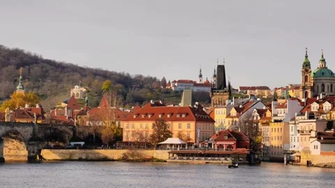 Prague Charles Bridge Vltava River golden hour 4K slow motion castle B-roll Stock Footage 327401005