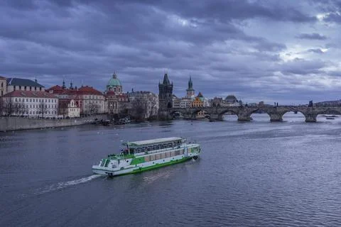 Prague city scape in December with river Vltava and Charles Bridge Stock Photos