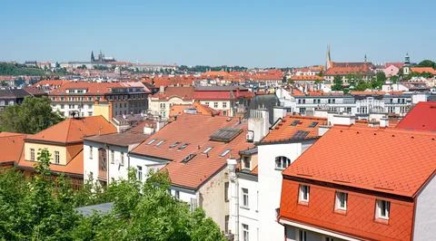 The Prague cityscape is featuring countless red roofs Stock Photos