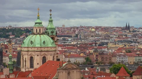 Prague cityscape timelapse with St. Nicholas Church dome on cloudy day Stock Footage 317220268