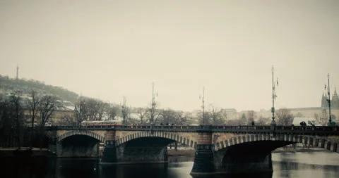 Prague, CZ - 01 12 2026:  Red tram driving across Legion Bridge. Stock Footage 339501929