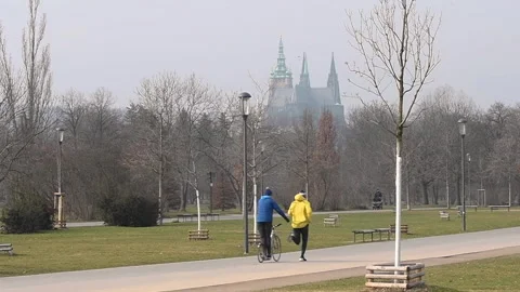 Prague, Czech Republic. 01-15-2021. People are running with view of an old an Stock Footage 151522469