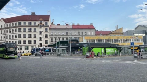 Prague, Czech Republic  August 6, 2026 selective focus coaches driving thro.. Stock Footage 344802600