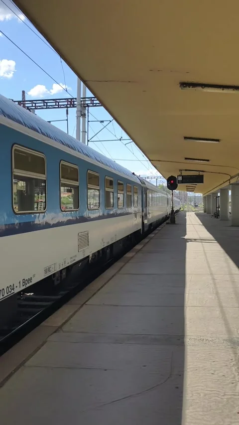 Prague, Czech Republic - July 22, 2026: Passenger train vertical 4K slow motion Stock Footage 340260195