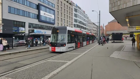Prague, Czech Republic – March 3, 2026: Tram in Slow Motion at Intersection Stock Footage 330072161