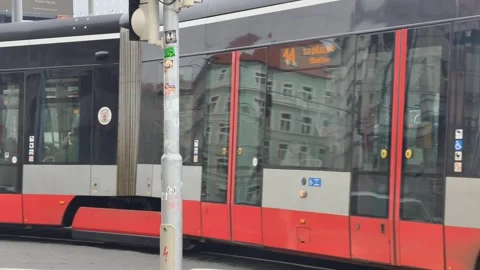 Prague, Czech Republic – March 3, 2026: Tram in Slow Motion at Intersection Stock Footage 330074161