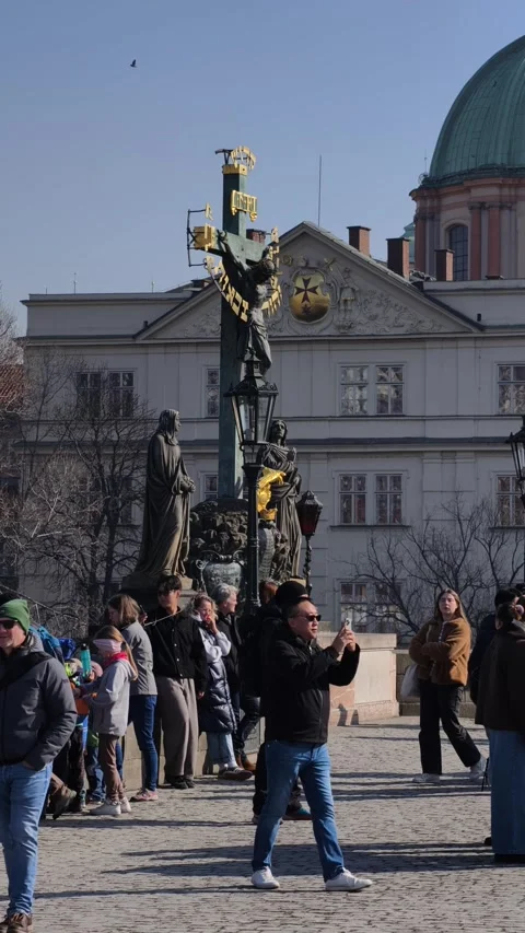 Prague, Czech Republic – March 5, 2026: Charles Bridge Tourists and Artists Stock Footage 330188944