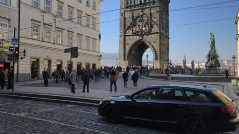 Prague, Czech Republic – March 5, 2026: Charles Bridge Tourists and Artists Stock Footage 330189166