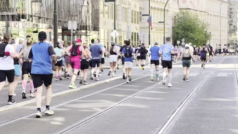 Prague, Czech Republic – May 3, 2026: Prague Marathon runners on city streets Stock Footage 333974800