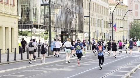 Prague, Czech Republic – May 3, 2026: Prague Marathon runners on city streets Stock Footage 333974860