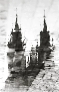 Prague, Czech Republic: a reflection in a puddle of the Cathedral. An artistic Stock Photos