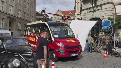 PRAGUE, CZECH REPUBLIC – SEPTEMBER 1, 2026: Film crew shooting a movie 4K video Stock Footage 344331854