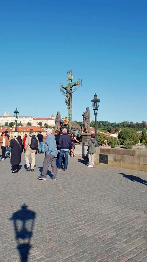 Prague, Czech Republic – September 23, 2026: Tourists on the Charles Bridge Stock Footage 346289955