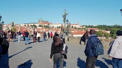 Prague, Czech Republic – September 23, 2026: Tourists on the Charles Bridge Stock Footage 346289956