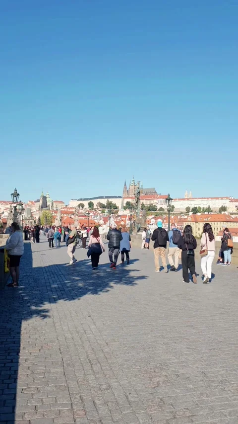 Prague, Czech Republic – September 23, 2026: Tourists on the Charles Bridge Stock Footage 346289958