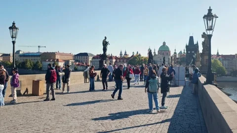 Prague, Czech Republic – September 23, 2026: Tourists on the Charles Bridge Stock Footage 346289972